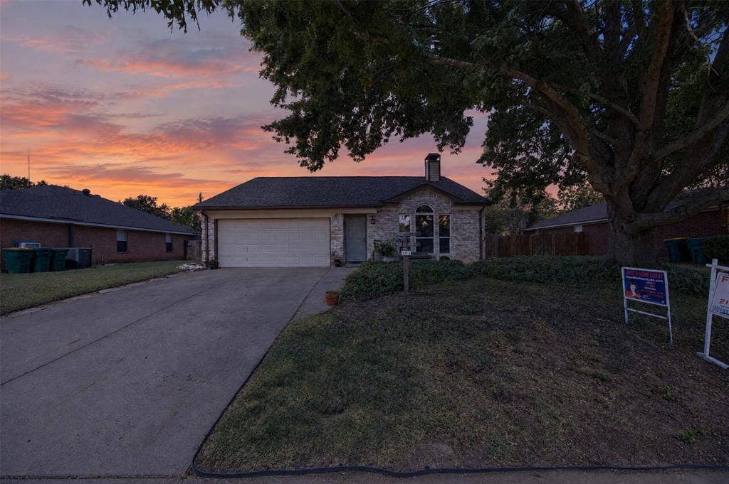 203 Briarglen Drive, Cedar Hill, TX 75104 Brick exterior with a prominent arched window and chimney