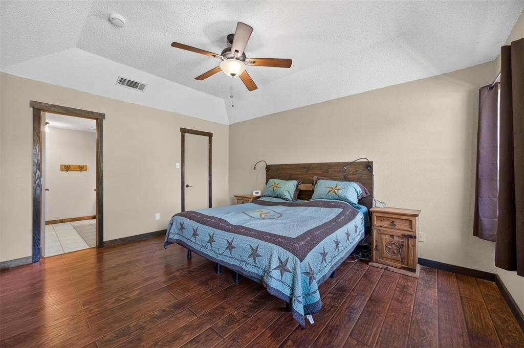 203 Briarglen Drive, Cedar Hill, TX 75104 Tray ceiling with a ceiling fan light fixture, wood-finish flooring, and recessed lighting
