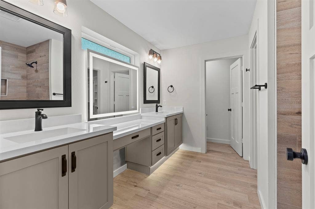 16514 Crossing Circle, Lindale, TX 75771 Dual vanity with integrated sinks, quartz countertops, and matte black hardware