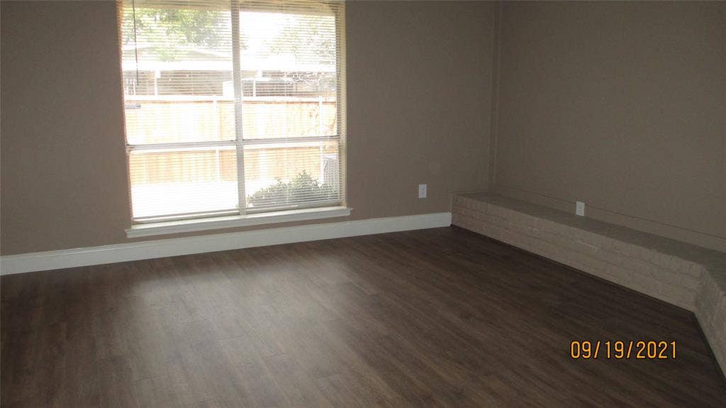 13433 Blossomheath Lane, Dallas, TX 75240 View of living room with large window for lots of light