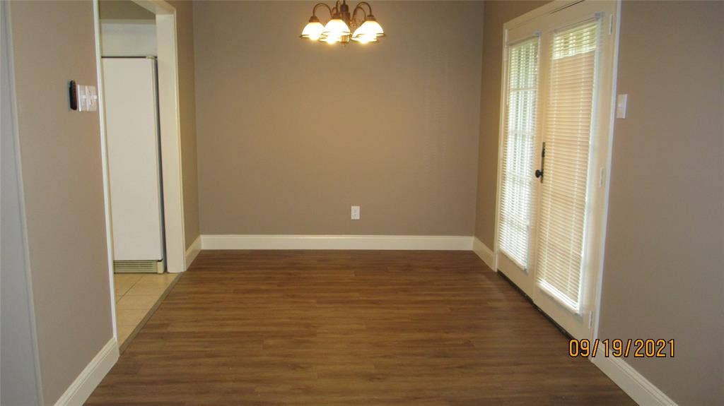 13433 Blossomheath Lane, Dallas, TX 75240 Dining room has French doors to back yard