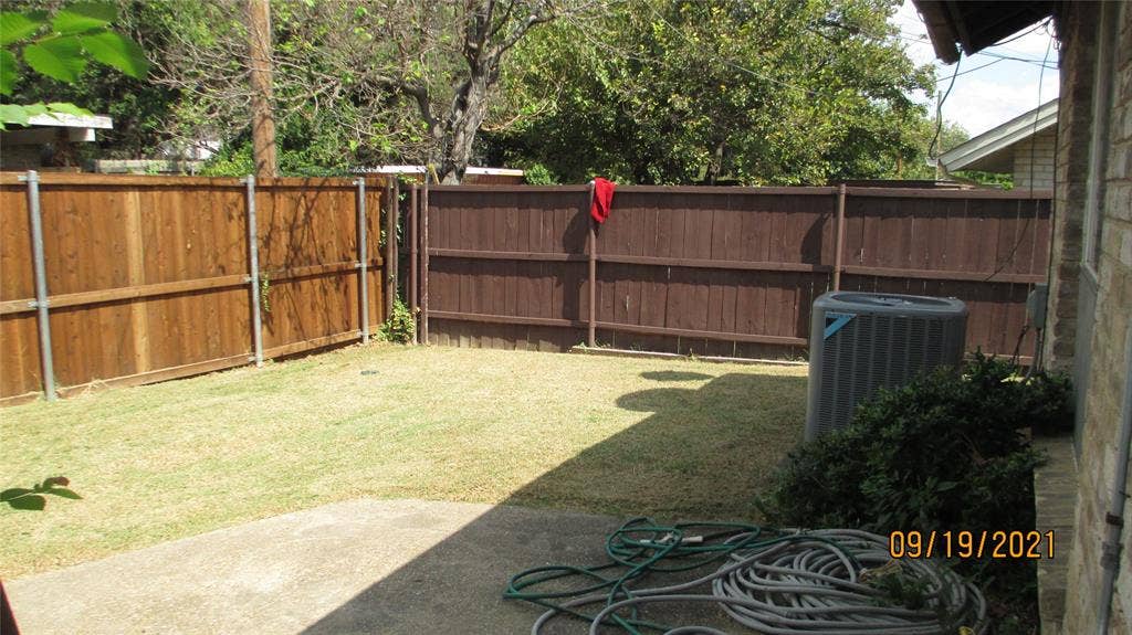 13433 Blossomheath Lane, Dallas, TX 75240 Good size yard with yard care