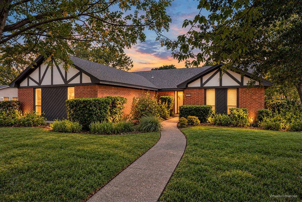 544 Jason Street, Robinson, TX 76706 Brick exterior featuring Tudor-style gables and dark trim