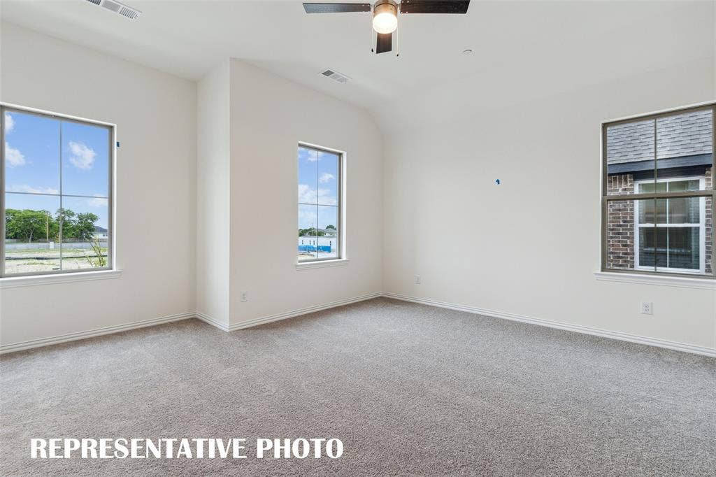 4733 Lunker Street, McKinney, TX 75071 A light filled owner's suite that offers high ceilings, tons of natural light, his & hers walk in closets....our Hansen floor plan has it all! REPRESENTATIVE PHOTO