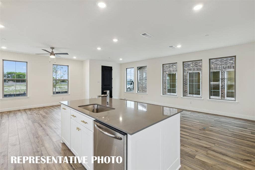 4733 Lunker Street, McKinney, TX 75071 The chef in the family will never be left out of the party in this fabulous home! REPRESENTATIVE PHOTO