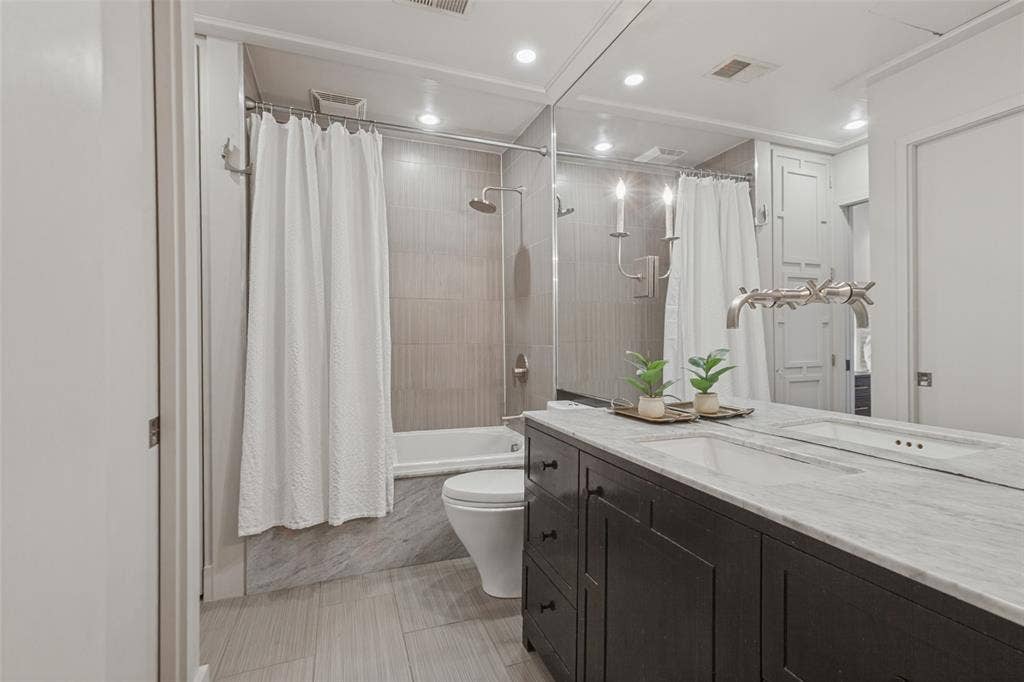 3818 N Hall Street, #128, Dallas, TX 75219 Upstairs bathroom updated with quartz counters-complete w a closet and linen cabinet