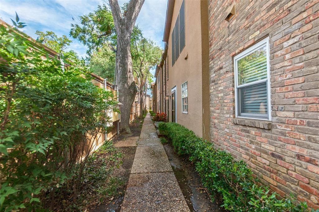 3818 N Hall Street, #128, Dallas, TX 75219 This complex lives like a townhome.