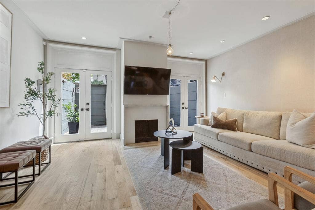 3818 N Hall Street, #128, Dallas, TX 75219 Beautiful, updated two-story unit tucked away in the Tall Trees Condominiums!