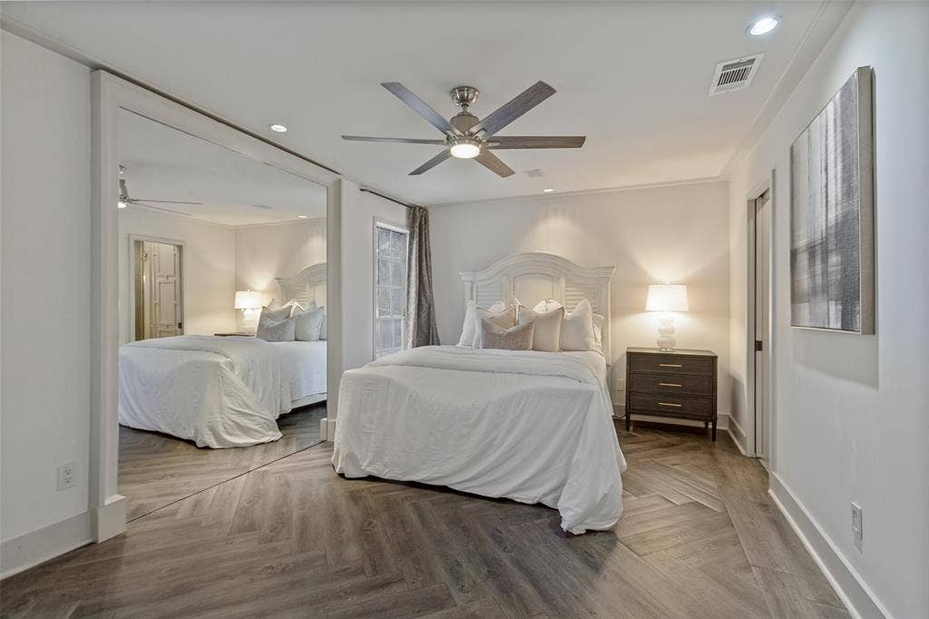 3818 N Hall Street, #128, Dallas, TX 75219 Primary bedroom with luxury vinyl plank flooring