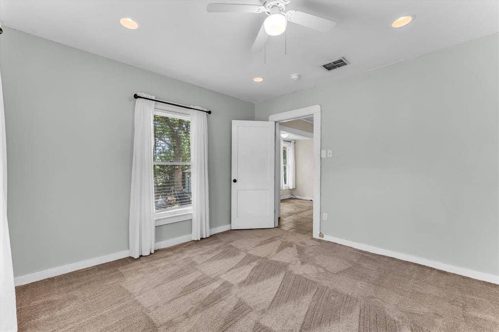 302 W Billington Drive, Robinson, TX 76706 Recessed ceiling lighting, ceiling fan, carpet flooring, window with blinds, and white interior door