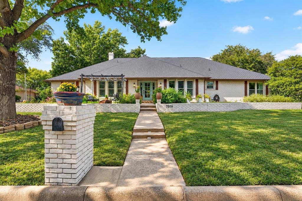 7016 Battle Creek Road, Fort Worth, TX 76116 White brick exterior with a dark shingle roof