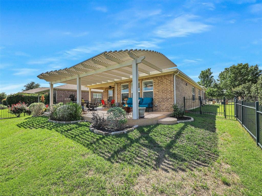 7470 Birmingham Forest Drive, Frisco, TX 75036 Rear view of house featuring a pergola, a patio area, and a yard