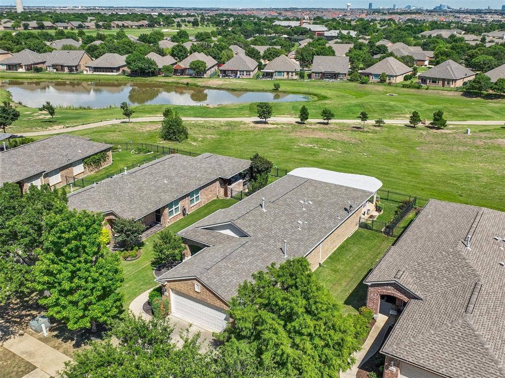 7470 Birmingham Forest Drive, Frisco, TX 75036 Aerial view with a water view