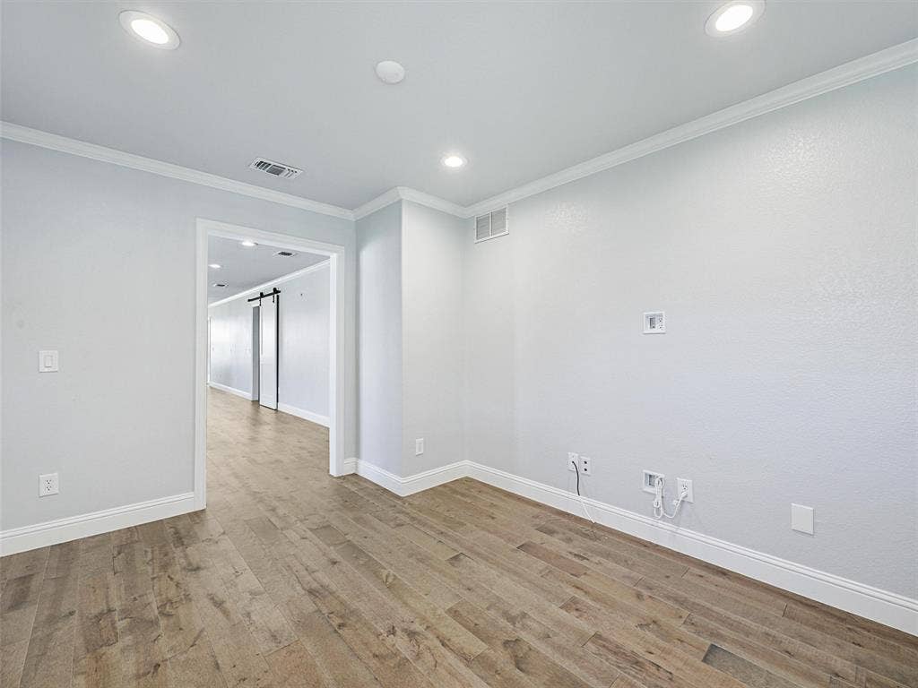 7470 Birmingham Forest Drive, Frisco, TX 75036 Study or extra bedroom with crown molding and LVP.