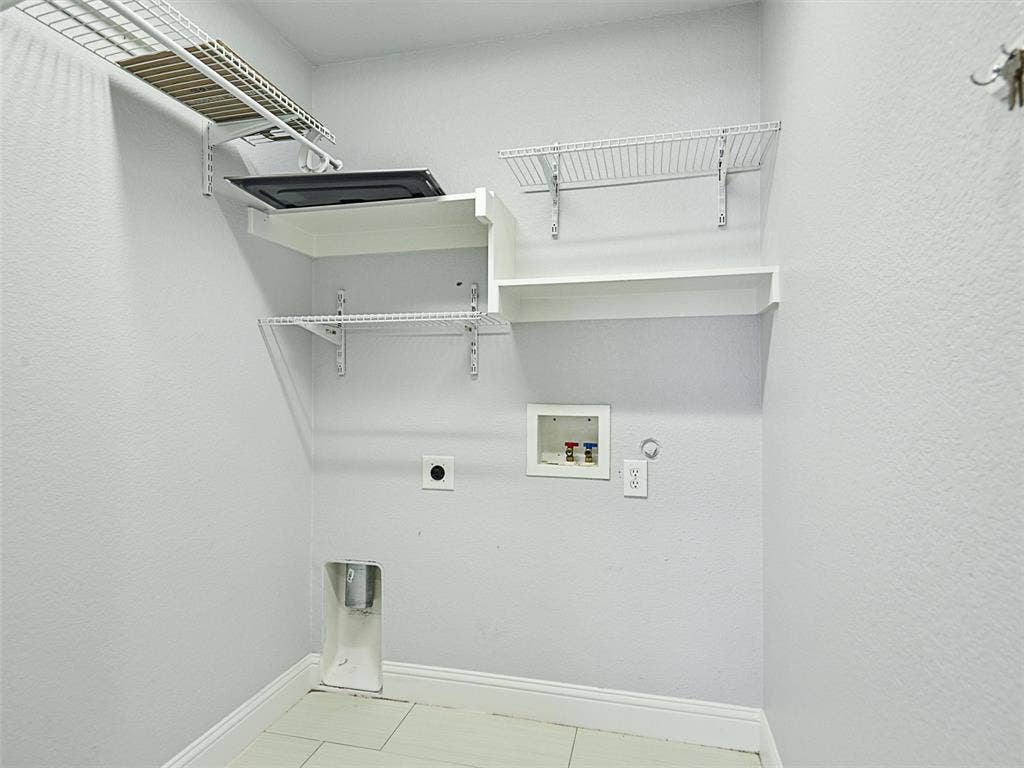 7470 Birmingham Forest Drive, Frisco, TX 75036 Laundry room featuring tile floors, gas dryer hookup, washer hookup, and electric dryer hookup