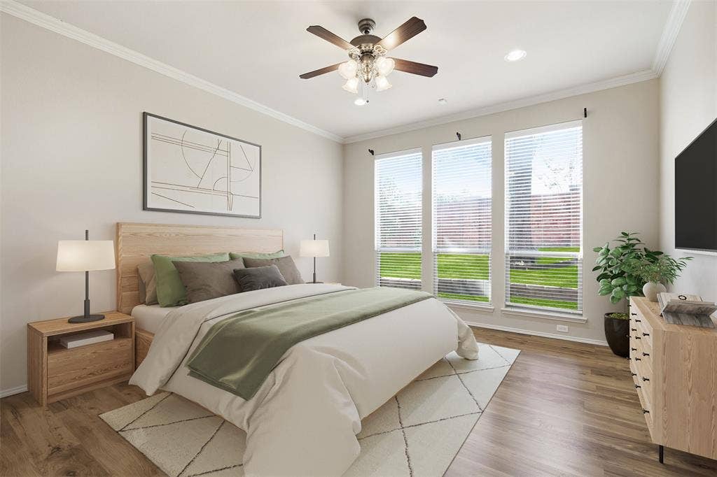 750 Village Green Drive, DeSoto, TX 75115 Crown molding, wood-finish flooring, recessed lighting, ceiling fan, and a trio of large windows. Virtually Staged