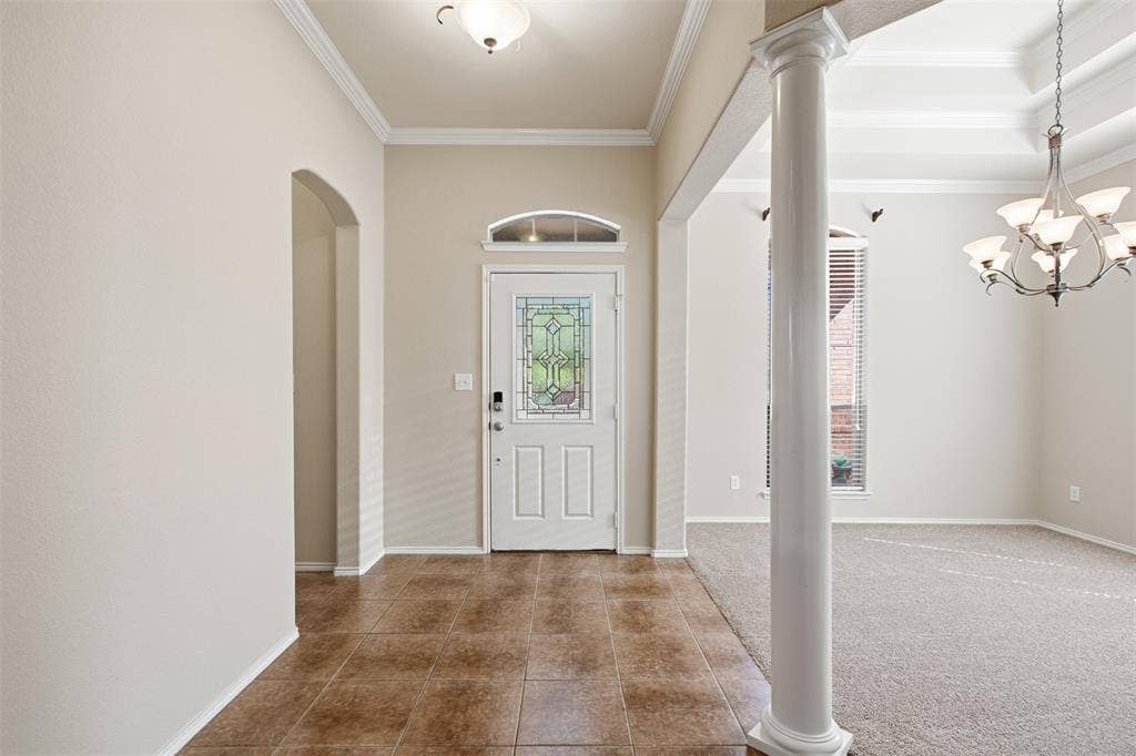 750 Village Green Drive, DeSoto, TX 75115 Tiled entryway with decorative glass door and transom window