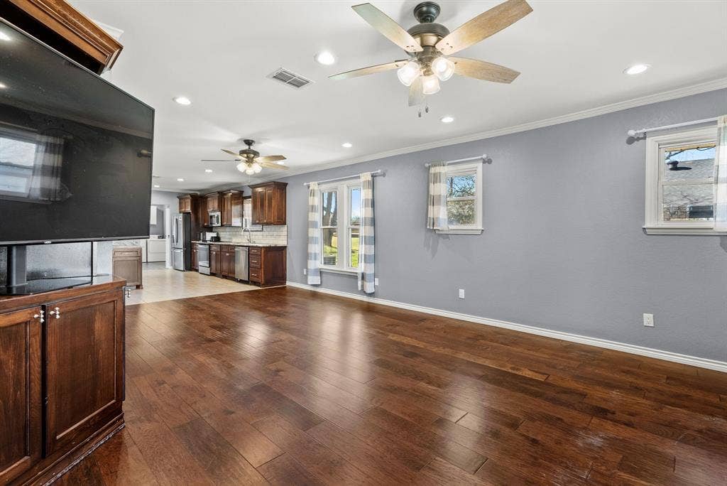 605 Dallas Street, Winona, TX 75792 Hardwood flooring throughout the main living area