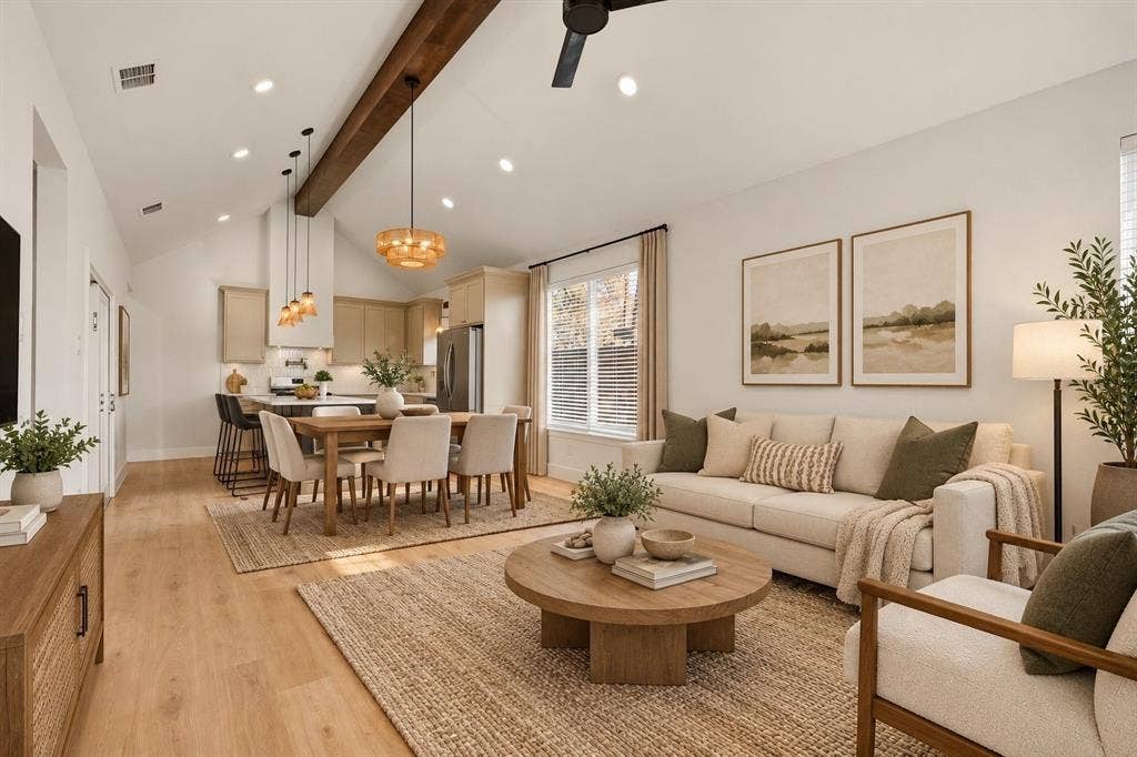 1601 Birdell Street, Fort Worth, TX 76105 Virtually Staged:Open-concept living area with vaulted ceilings, exposed wood beam, recessed lighting, and wood-finish flooring