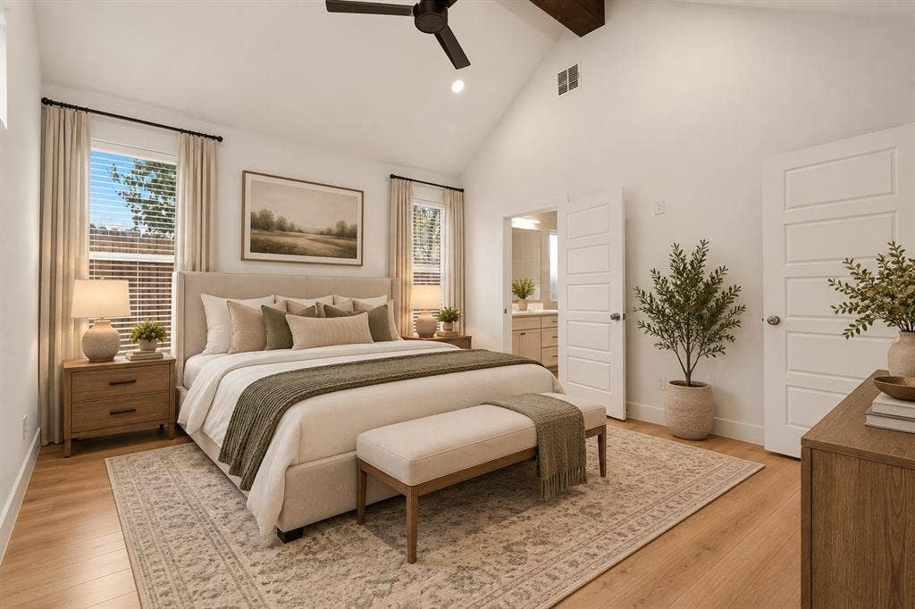 1601 Birdell Street, Fort Worth, TX 76105 Vaulted ceiling with exposed wood beam, wood-finish flooring, two large windows with blinds, ceiling fan, and five-panel interior doors