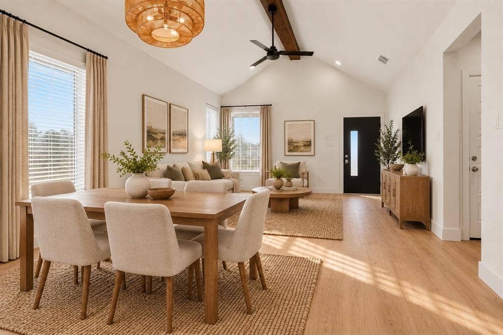 1601 Birdell Street, Fort Worth, TX 76105 Virtually staged: Vaulted ceiling with exposed wood beam, wood-finish flooring, recessed lighting, and ample natural light from multiple windows