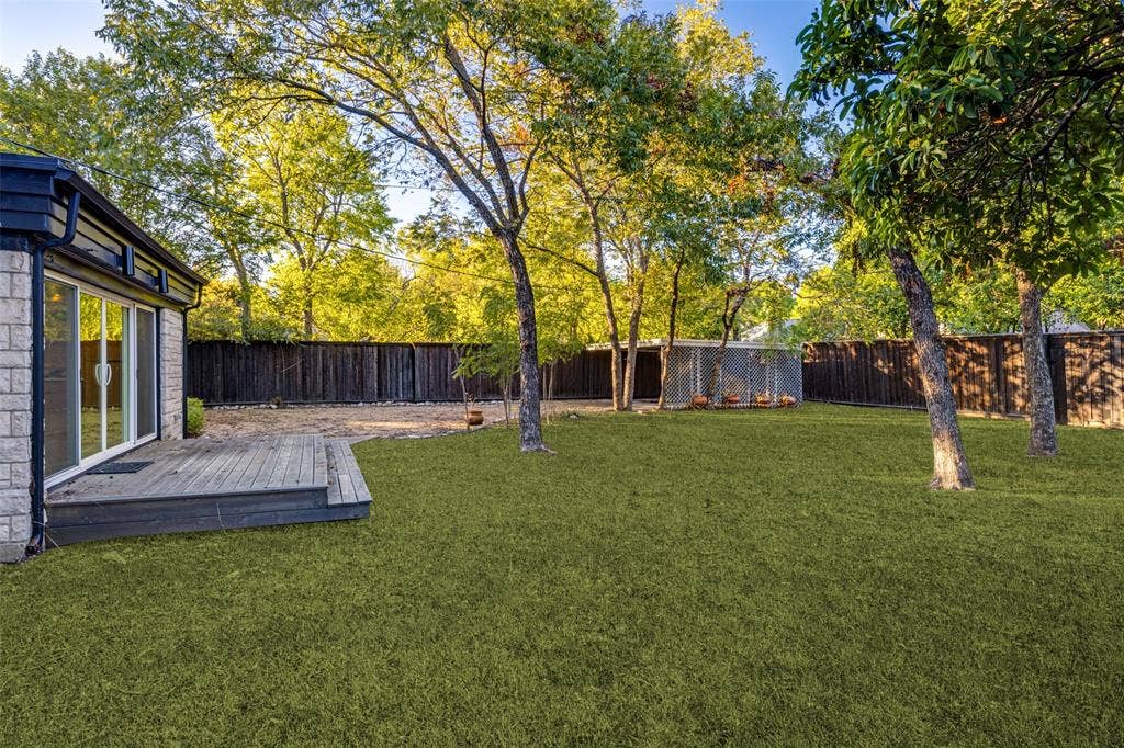 1434 Tranquilla Drive, Dallas, TX 75218 Grass has been enhanced and placed with AI