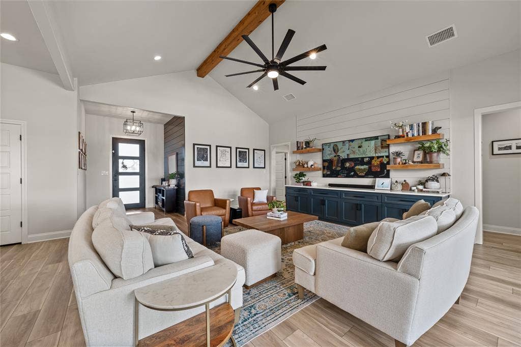 149 Water View Lane, Robinson, TX 76706 Vaulted ceiling with an exposed wood beam, wood-finish flooring, and recessed lighting