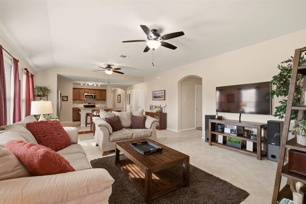 800 Amber Street, Princeton, TX 75407 Quick peak at this fabulous living room, spacious enough for multiple furniture pieces & open flow for entertaining as well.