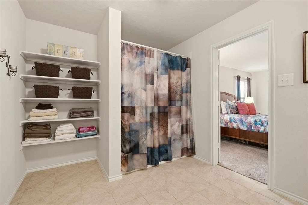 800 Amber Street, Princeton, TX 75407 Built-in storage & a walk-in shower in the primary bath.