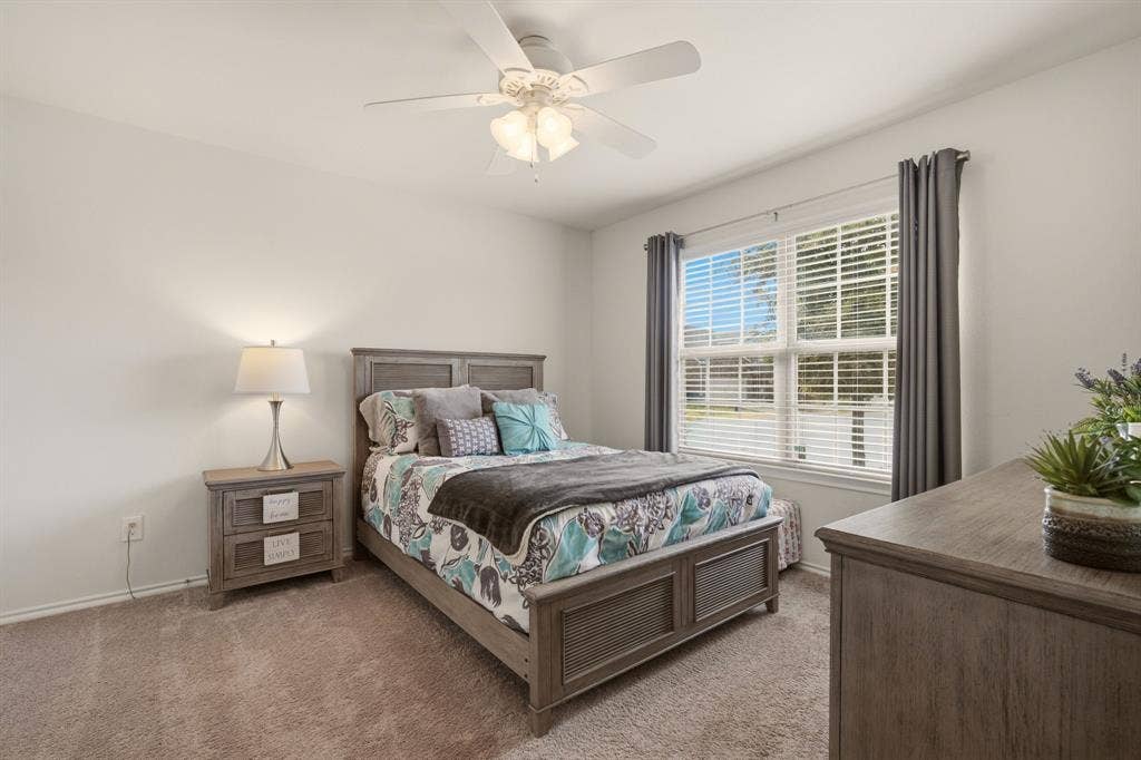 800 Amber Street, Princeton, TX 75407 Very cheery bedroom 2 faces the front of the home.