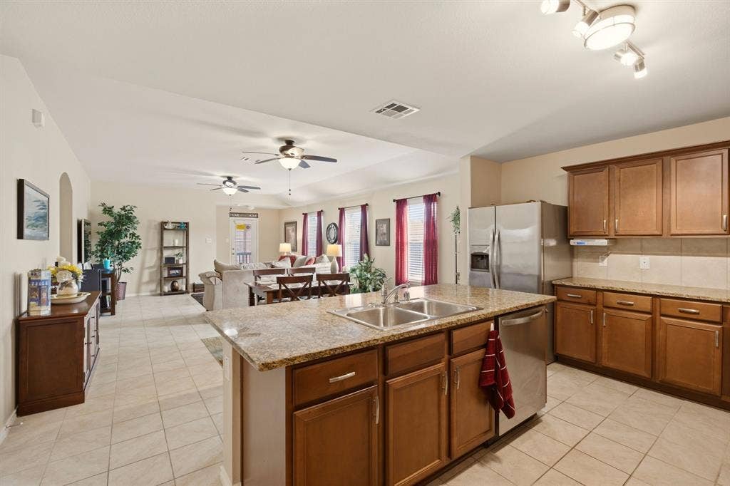 800 Amber Street, Princeton, TX 75407 A popular DRHorton floorplan notable for its seamless flow from kitchen to dining to living room--ideal for families & entertaining.