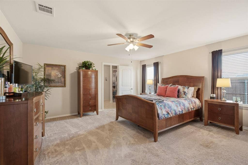 800 Amber Street, Princeton, TX 75407 Secluded primary suite offers a serene retreat, large enough for a sitting area & any size bedroom suit.