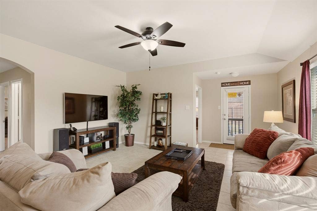800 Amber Street, Princeton, TX 75407 Primary bedroom is secluded in back to the left of the patio door. Secondary bedrooms 3 & 4 to the left of the TV, bedroom 2 faces the front of the home.