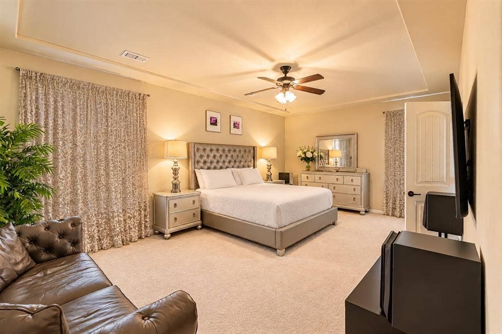 1704 Keswick Drive, McKinney, TX 75071 Recessed ceiling with an integrated ceiling fan, light-toned walls, and soft carpet flooring