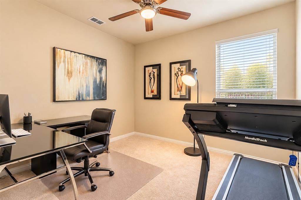 1704 Keswick Drive, McKinney, TX 75071 Recessed ceiling light with a wood-finish ceiling fan, neutral wall paint, and carpet flooring