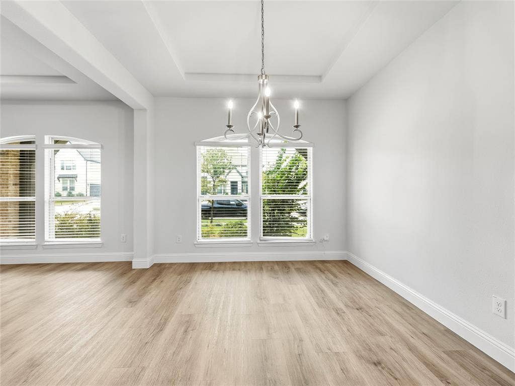 913 Peabody Drive, McKinney, TX 75071 dining area with pass through to kitchen