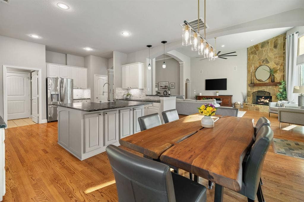 Decorative lighting and soapstone counters for a luxury look.
