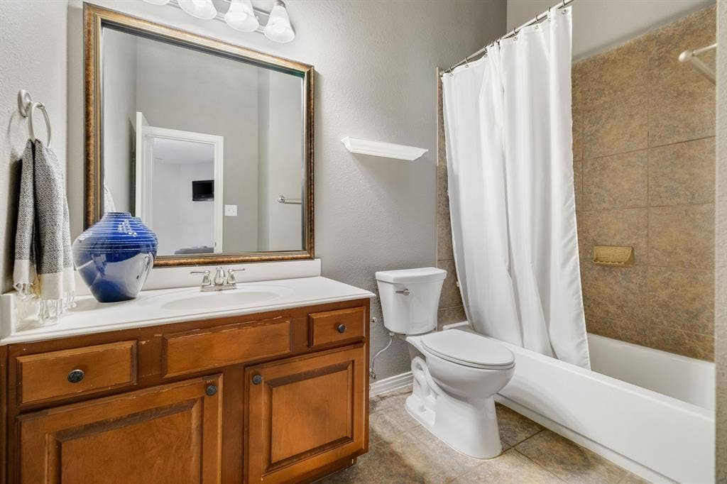 This bathroom is upstairs just outside of the bedroom.