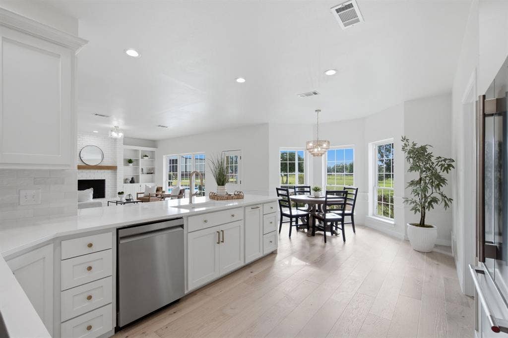 kitchen and breakfast area look over a magnificent tree