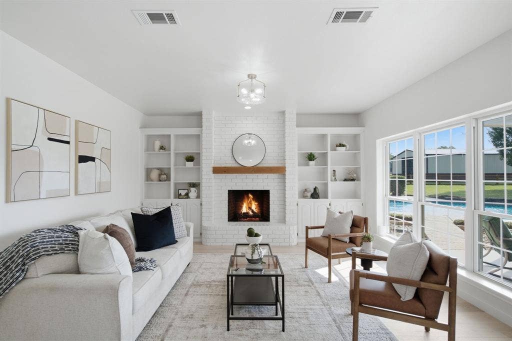 built in bookcases in family room overlooks pool