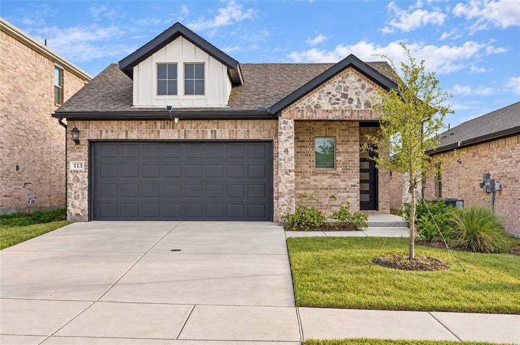 113 Greenbriar Drive, Princeton, TX 75071 Brick and stone exterior with dark trim accents