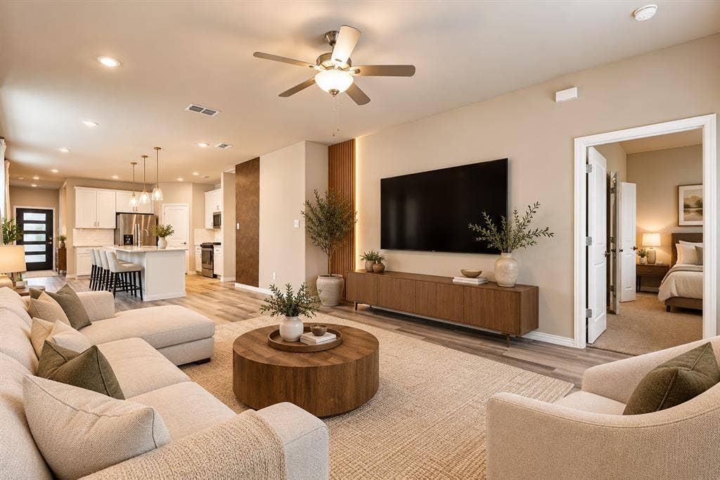 113 Greenbriar Drive, Princeton, TX 75071 Open-concept living space featuring wood-finish flooring, recessed lighting, and a ceiling fan
