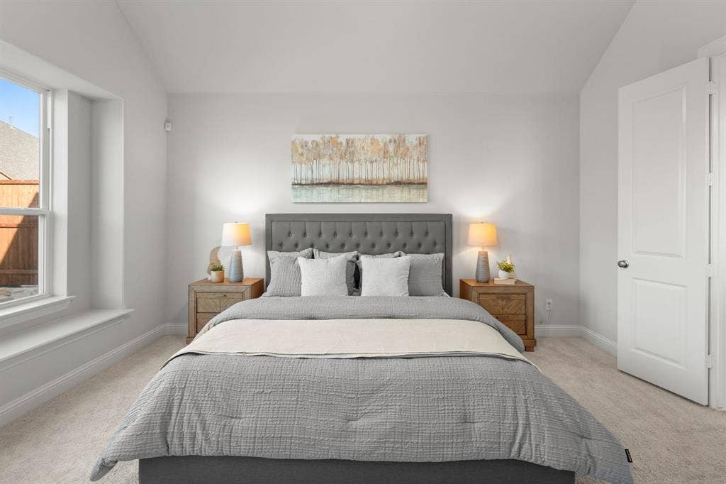 1320 Cartona Road, Fate, TX 75087 Light-filled room featuring a single window, neutral wall paint, and carpet flooring
