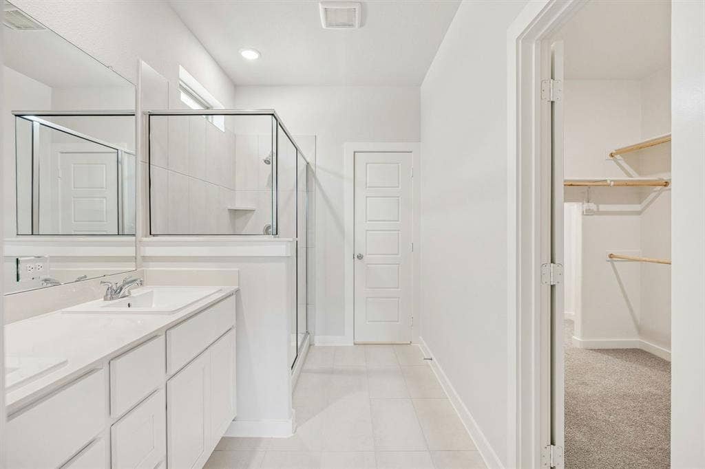 281 Hope Orchards Drive, Lavon, TX 75166 Primary Bathroom in the Stanley II home plan – REPRESENTATIVE PHOTO