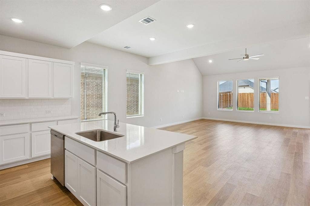 281 Hope Orchards Drive, Lavon, TX 75166 Open First Floor in the Stanley II home plan – REPRESENTATIVE PHOTO