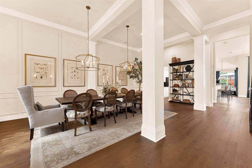 6429 GLENHOLLOW Drive, Plano, TX 75093 Crisp architectural wainscoting and strong structural pillars seamlessly define the dining quarters while keeping sightlines open toward the back of the home. Visualize hosting holiday meals where conversations flow effortlessly from predinnerdrinks into late-night dessert.