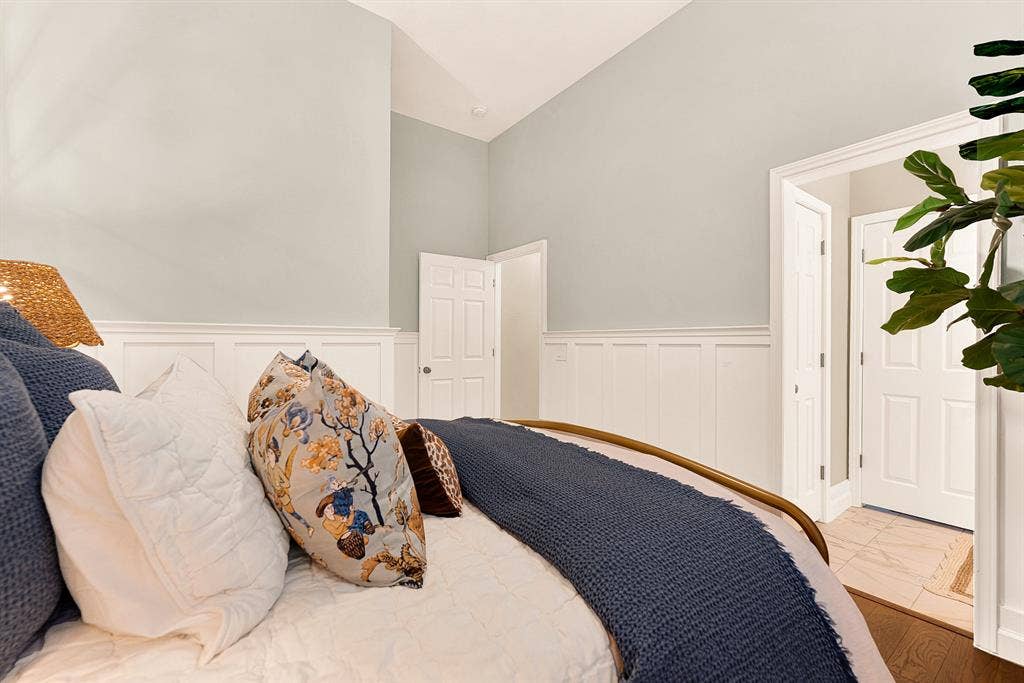 6429 GLENHOLLOW Drive, Plano, TX 75093 Crisp classic paneling runs along the lower walls,seamlessly anchoring the doorways and warm wood flooring. Imagine visiting family members enjoying a peaceful morning reading session in their private retreat