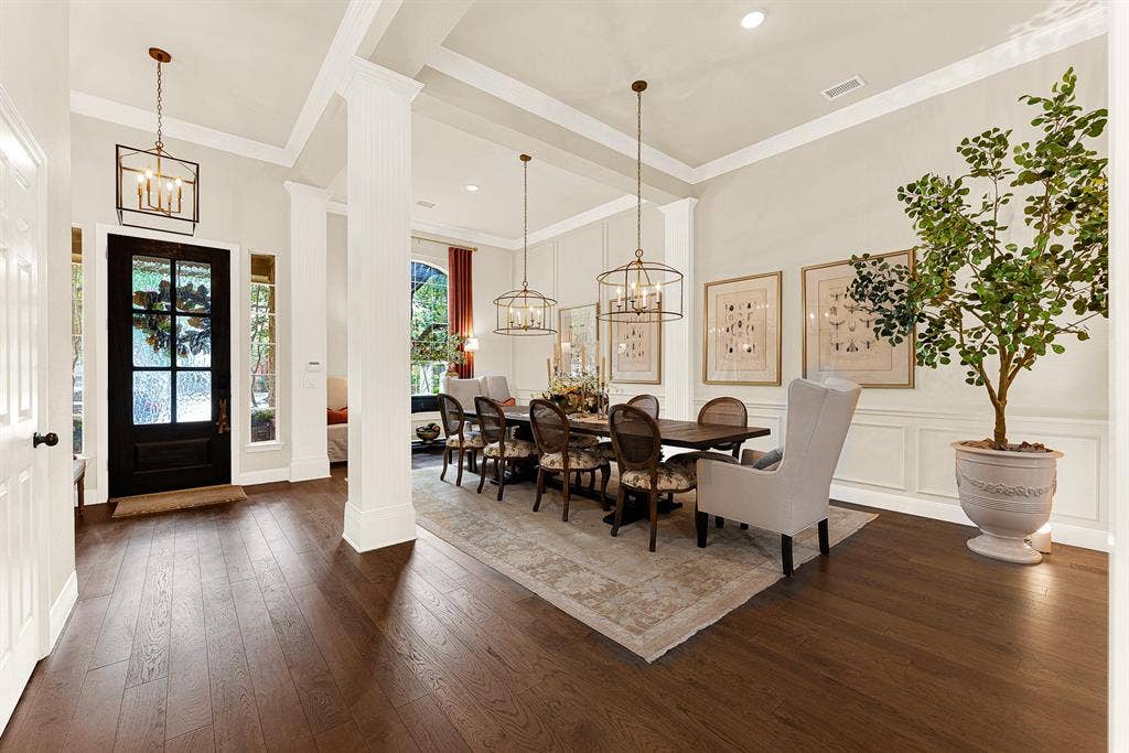 6429 GLENHOLLOW Drive, Plano, TX 75093 Rich 2024 engineered wood floors anchor the grand entrance, catching soft natural light that filters past classic interior columns. Picture welcoming longtime friends for a festive dinner party as laughter spills naturally across the open floor plan.