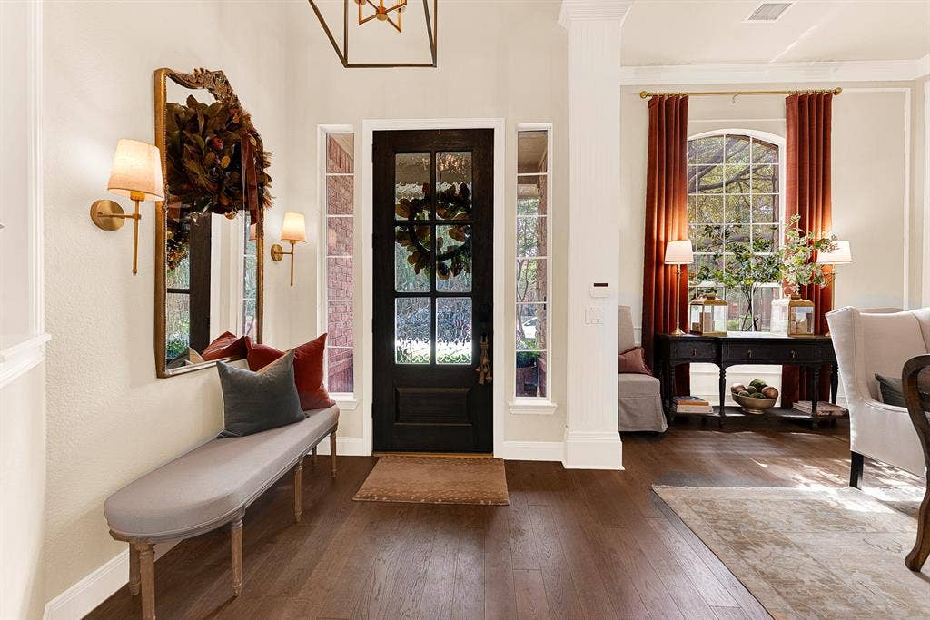 6429 GLENHOLLOW Drive, Plano, TX 75093 The handsome front door replaced in 2025 stands alongside glass sidelights and plantation shutters, casting bright rays over a spacious foyer. Envision kicking off your shoes after a quick neighborhood stroll and taking a quiet moment to unwind.