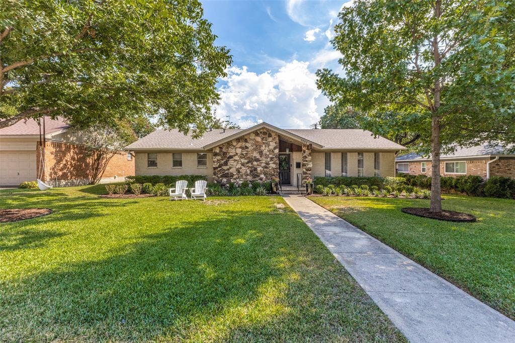 9864 Shoreview Road, Dallas, TX 75238 Single-story brick exterior with a prominent stone facade